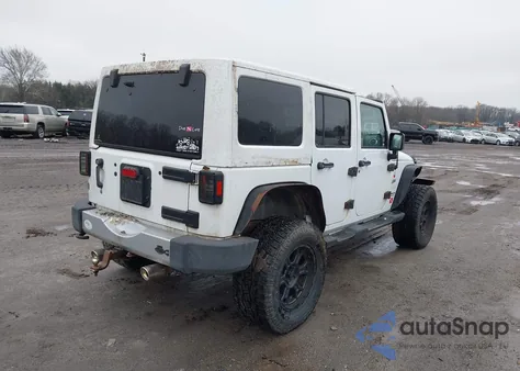 2011 Jeep Wrangler Unlimited Sahara из США, поврежденный, VIN 1J4HA5H10BL602015